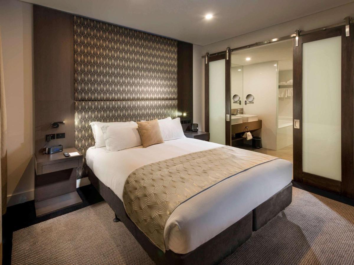 풀먼 브리즈번 공항 호텔 외부 사진 A bedroom at the hotel